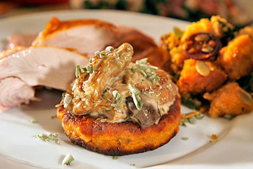 TO BEGIN: Creamy mushroom ragout over sweet potato cakes.