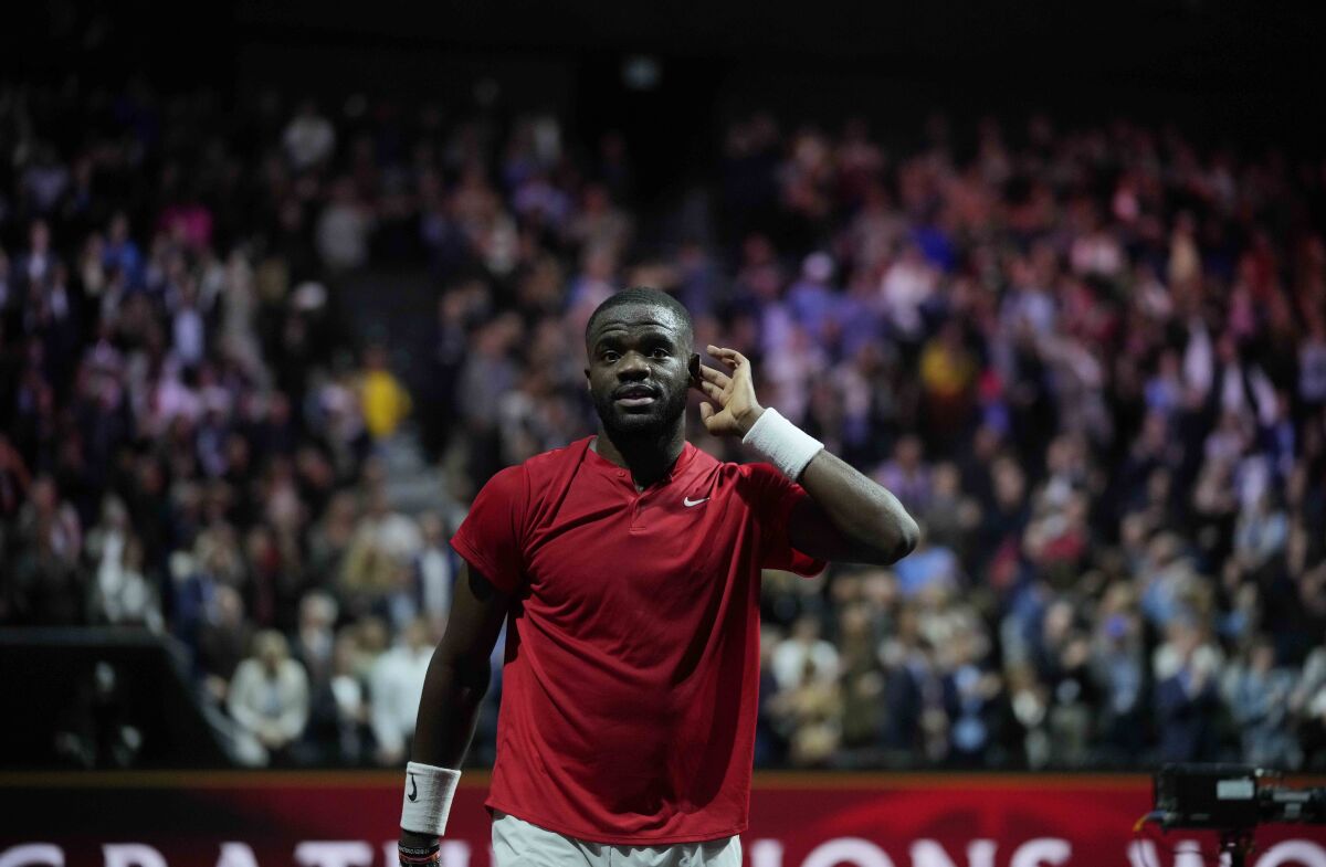 Team World's Frances Tiafoe gestures during his singles tennis match against Team Europe's Stefanos Tsitsipas on the third day of the Laver Cup tennis tournament at the O2 arena in London, Sunday, Sept. 25, 2022. (AP Photo/Kin Cheung)