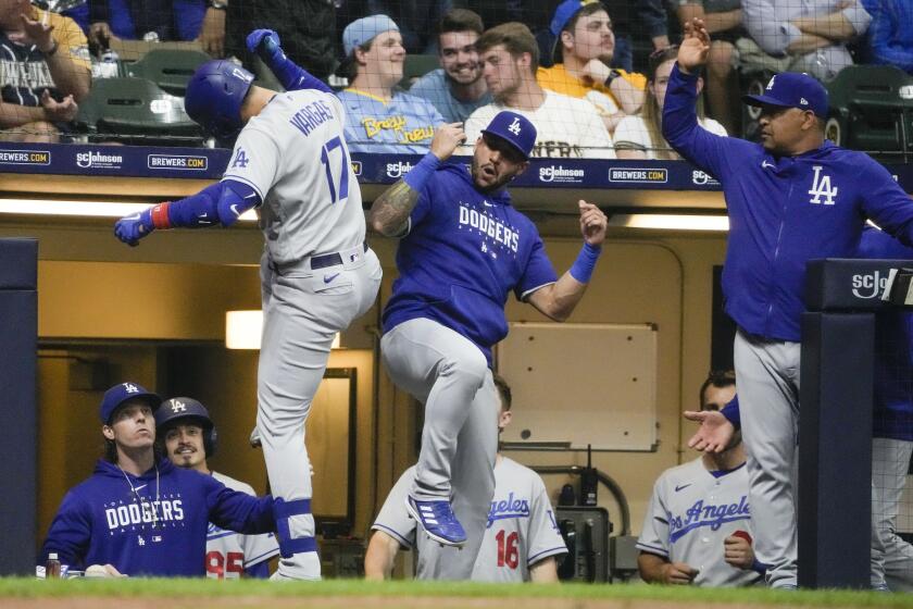 Los Angeles Dodgers' Miguel Vargas celebrates after hitting a two-run home run during the sixth inning of a baseball game against the Milwaukee Brewers Tuesday, May 9, 2023, in Milwaukee. (AP Photo/Morry Gash)