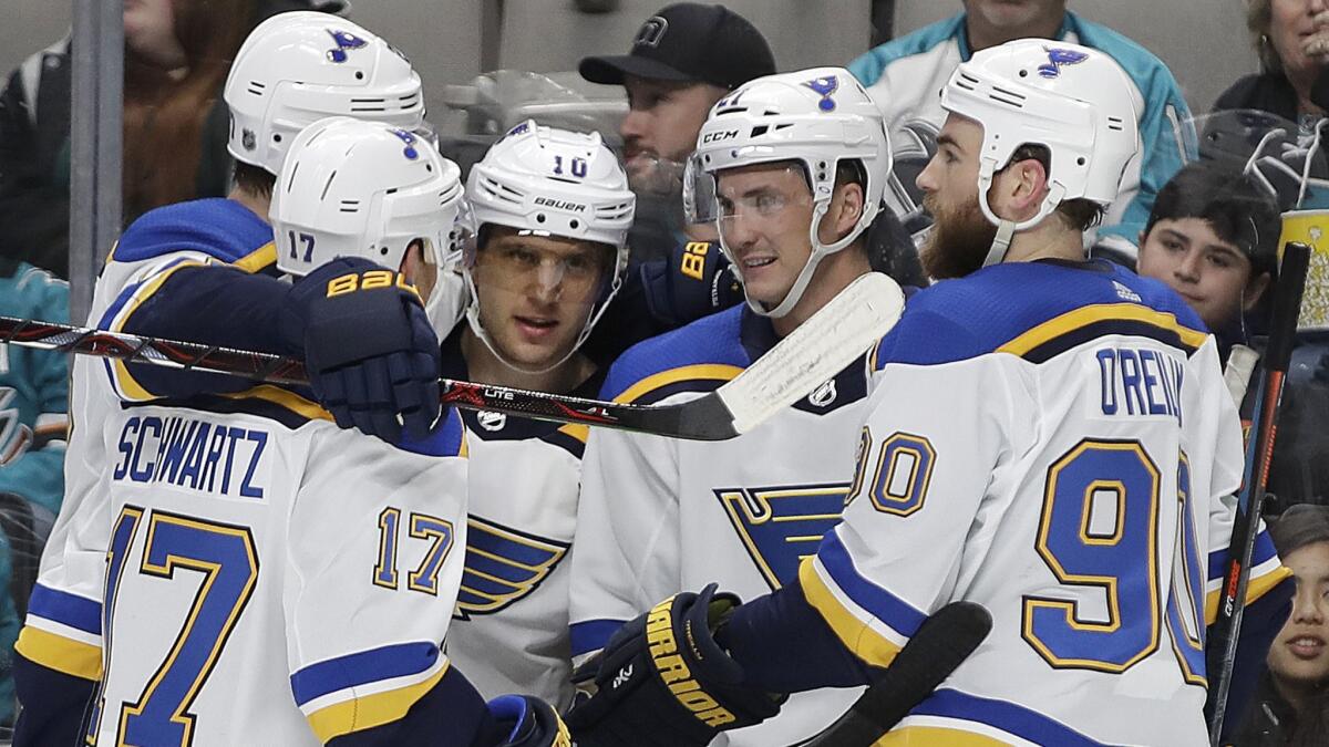 St. Louis Blues forward Brayden Schenn (10) celebrates with teammates after scoring against the San Jose Sharks on March 9.