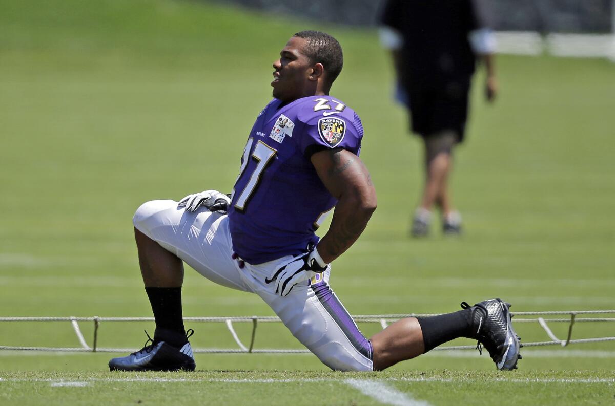 Baltimore running back Ray Rice stretches at training camp on Saturday.