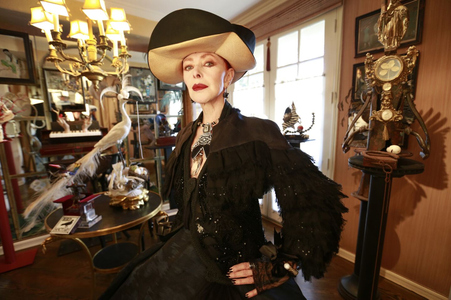 Valerie von Sobel, who is on the cover of the book "Advanced Style: Older and Wiser," is photographed with her artwork at her home.