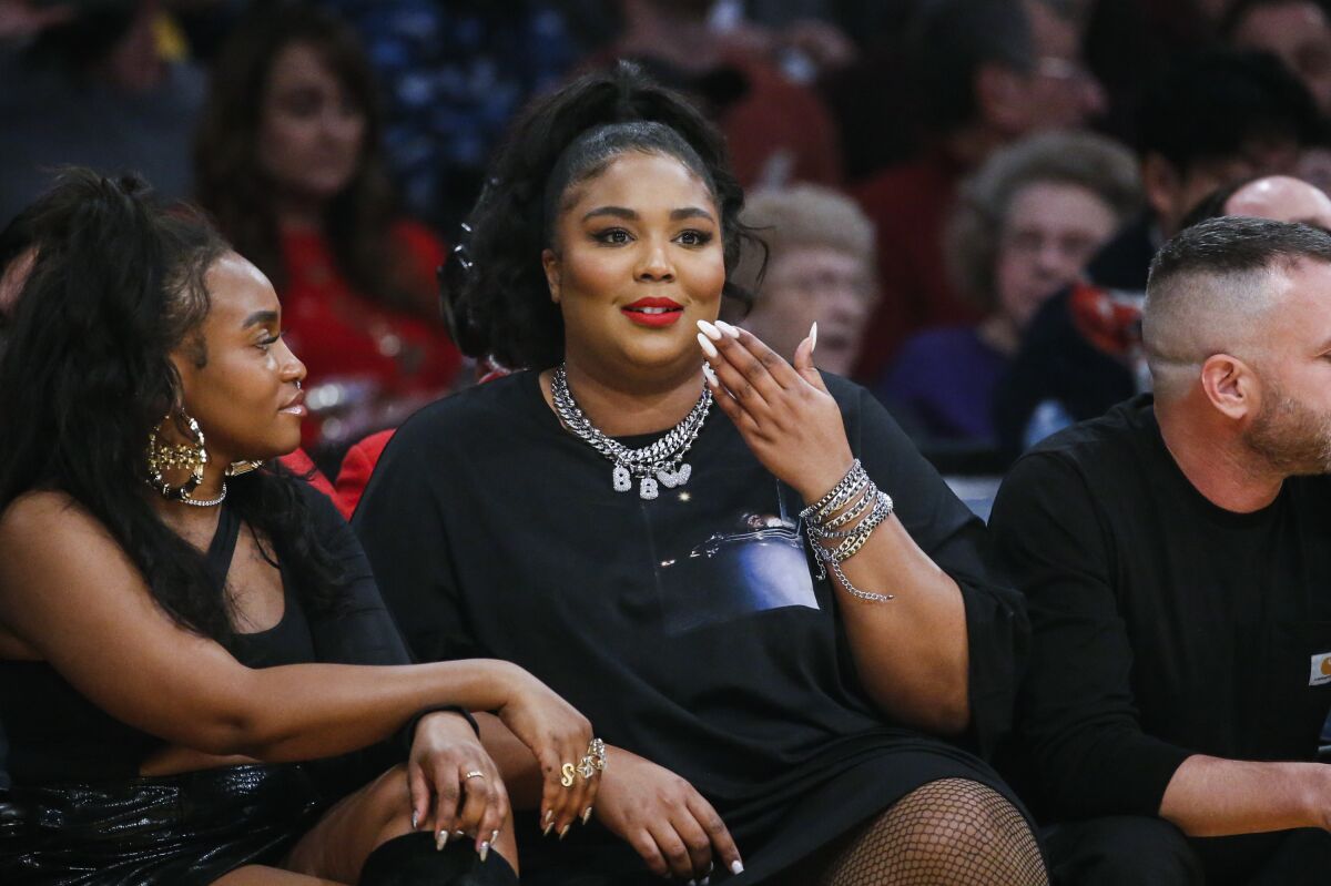 Singer Lizzo attends a game between Lakers and Minnesota Timberwolves on Sunday at Staples Center.