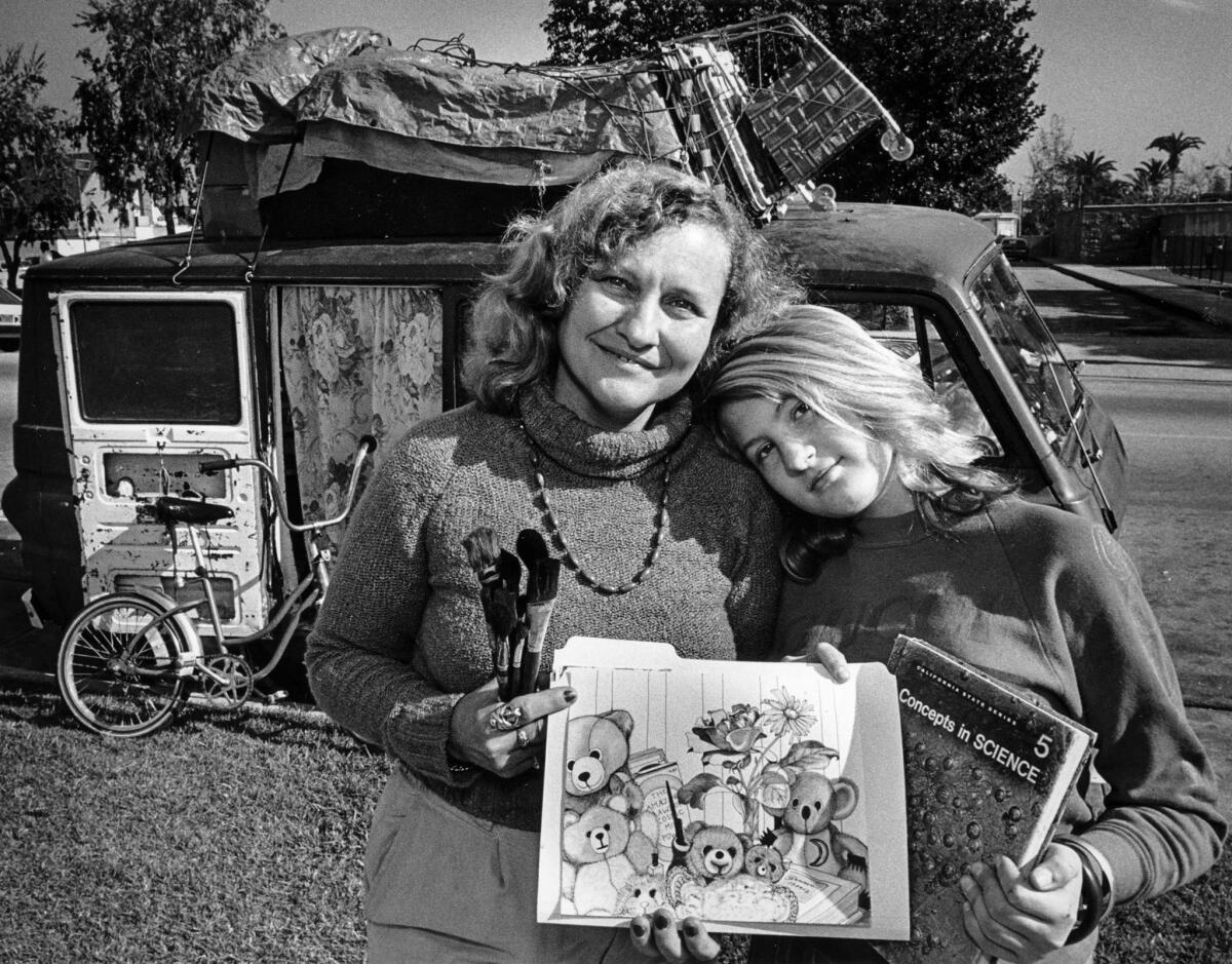 Jan. 12, 1987: Geneva Reese, 36, and daughter Eve, 13, live in a van. Reese, an artist, holds her sketchbook, while Eve holds a textbook she studies.
