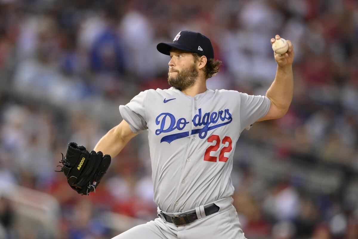 Dodgers pitcher Clayton Kershaw delivers against the Nationals.
