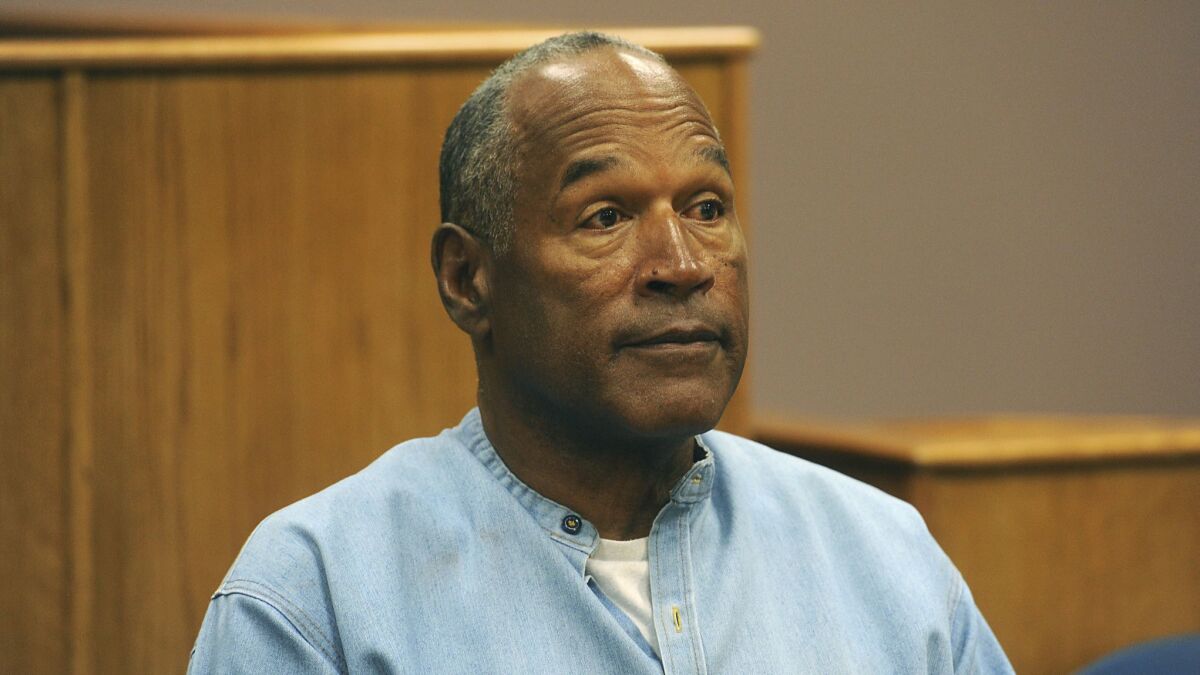 Former football star O.J. Simpson, pictured here at a parole hearing in 2017, started a Twitter account and posted a video saying, "I’ve got a little getting even to do."