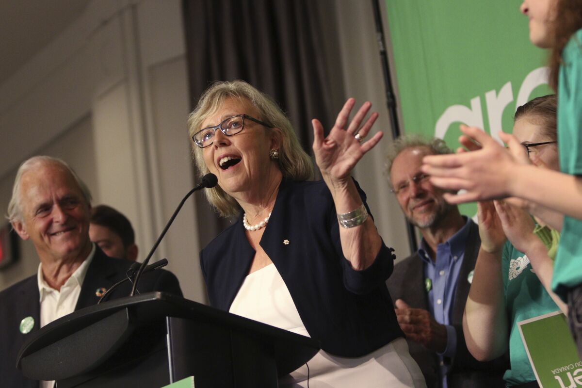 Canadian Green Party leader Elizabeth May announces the launch of the party's election campaign as she's joined by Green candidates during a news conference in Victoria, British Columbia, on Sept. 11, 2019.