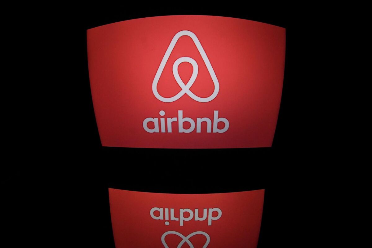 This photo shows the Airbnb logo on a computer screen.
