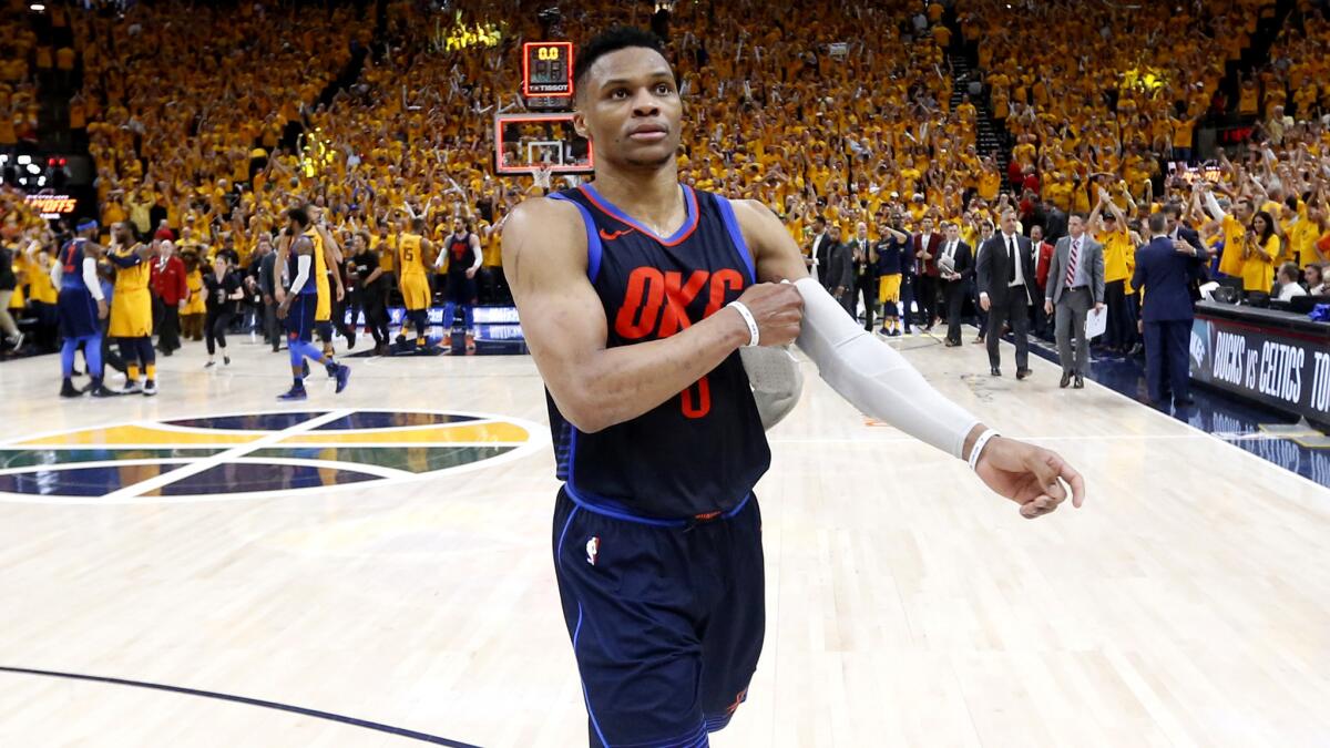 Russell Westbrook walks off the court after the Thunder were eliminated by the Jazz on Friday night.