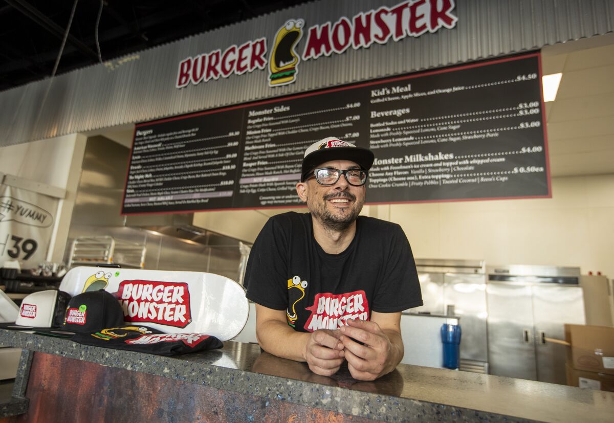 Brandon Takanabe is the owner of Burger Monster, a business in Grange Hall 39 at the Buena Park Mall.