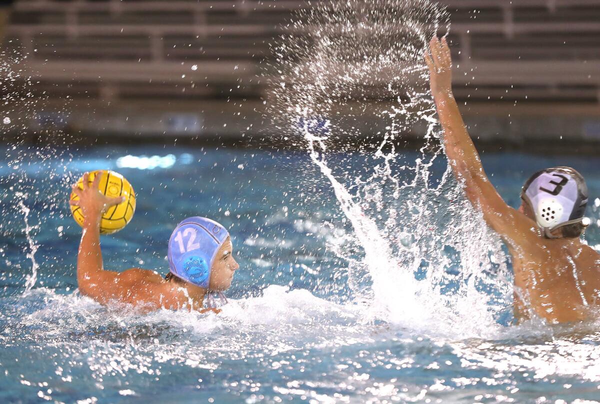CdM's Charles Warmington (12) prepares to shoot during the first round of the Division 1 playoffs against El Dorado.