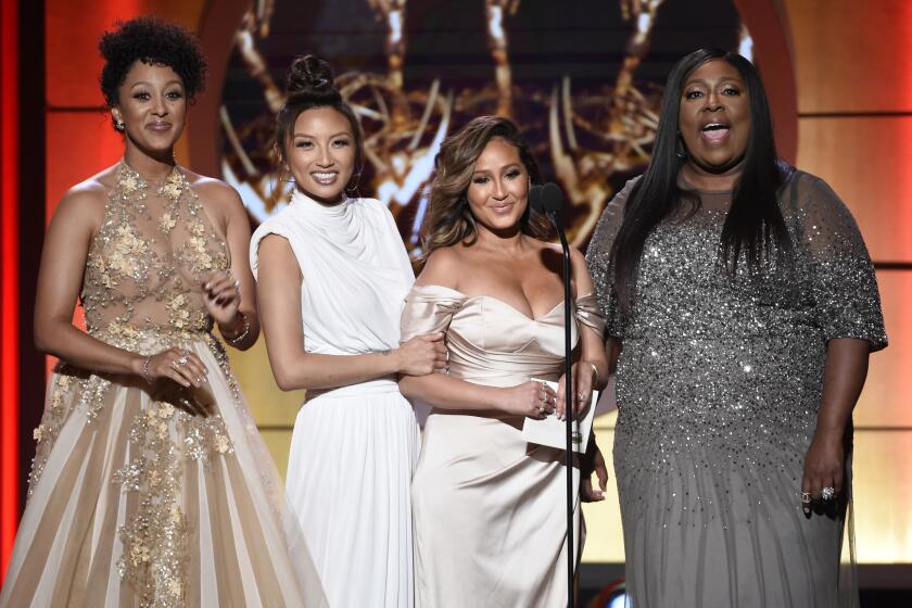 Tamera Mowry, from left, Jeannie Mai, Adrienne Bailon, and Loni Love present the award for outstanding supporting actor in a drama series at the 44th annual Daytime Emmy Awards at the Pasadena Civic Center on Sunday, April 30, 2017, in Pasadena, Calif. (Photo by Chris Pizzello/Invision/AP)