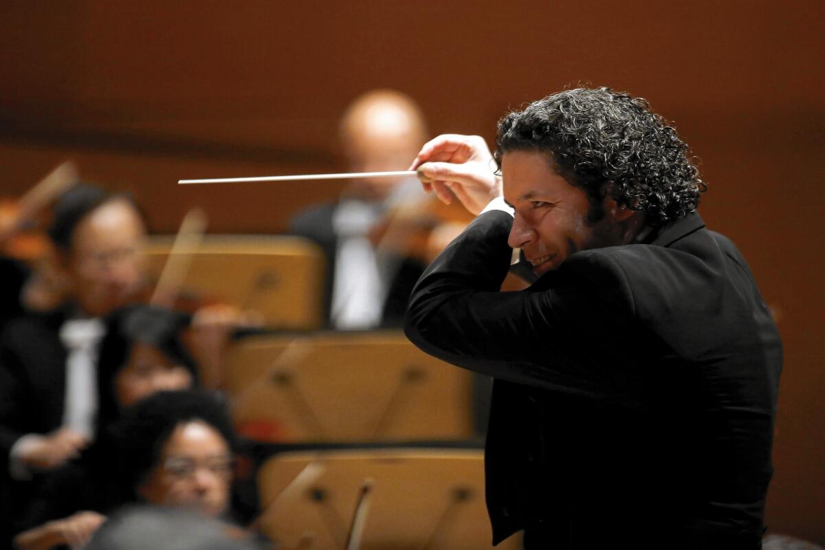 Gustavo Dudamel returned to Walt Disney Concert Hall on Thursday night to lead the first of the two programs that the Los Angeles Philharmonic will take on its annual tour next month.