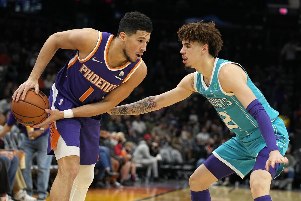 Devin Booker is one of the NBA's best scorers, but when will he start  winning games for the Phoenix Suns?