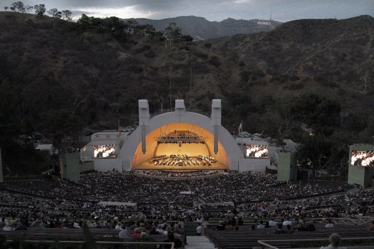 The Hollywood Bowl and surrounding hills at dusk.