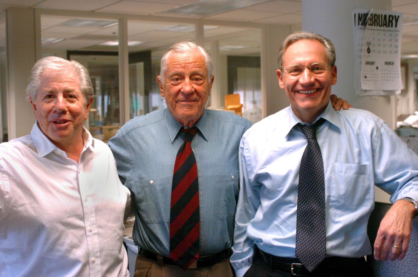 Former Washington Post reporter Carl Bernstein (left), who teamed with Bob Woodward (right) to break the Watergate scandal and write "All the President's Men," attended the University of Maryland. Additionally, Bernstein attended Montgomery Blair High School in Silver Spring, where he worked for the school's newspaper Silver Chips. Also pictured: Former Washington Post executive editor Ben Bradlee, center