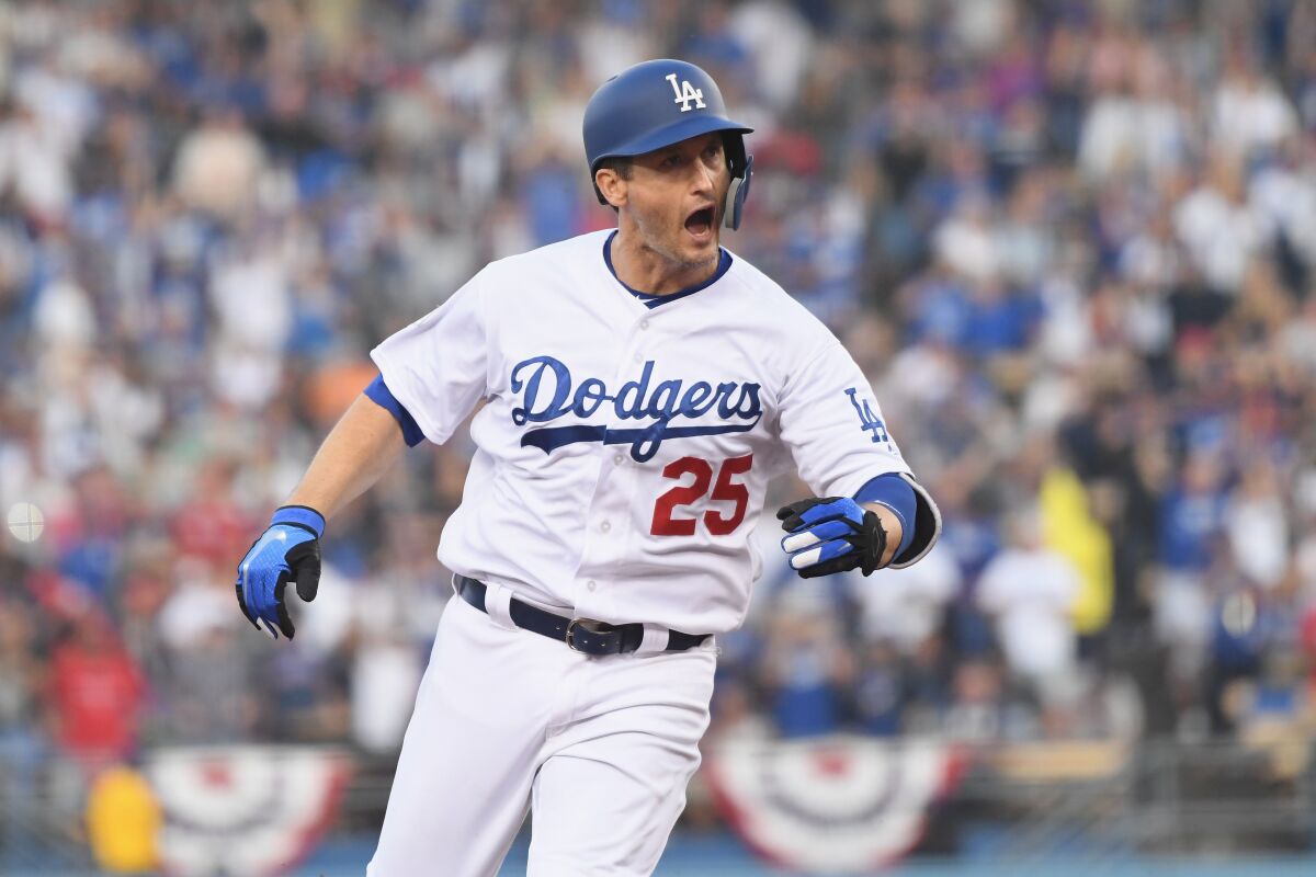 Dodgers first baseman David Freese retired from baseball Saturday after 11 seasons.