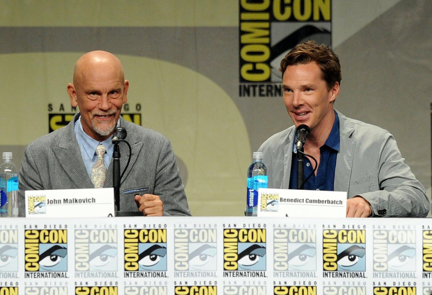 Actors John Malkovich (L) and Benedict Cumberbatch attend the DreamWorks Animation presentation.