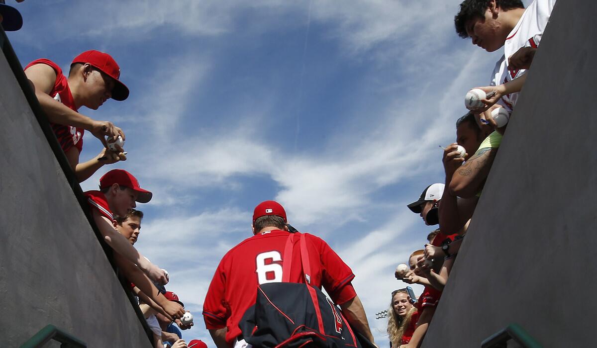 Angels third baseman David Freese (6) walks out of the clubhouse for a Cactus League game last spring training.