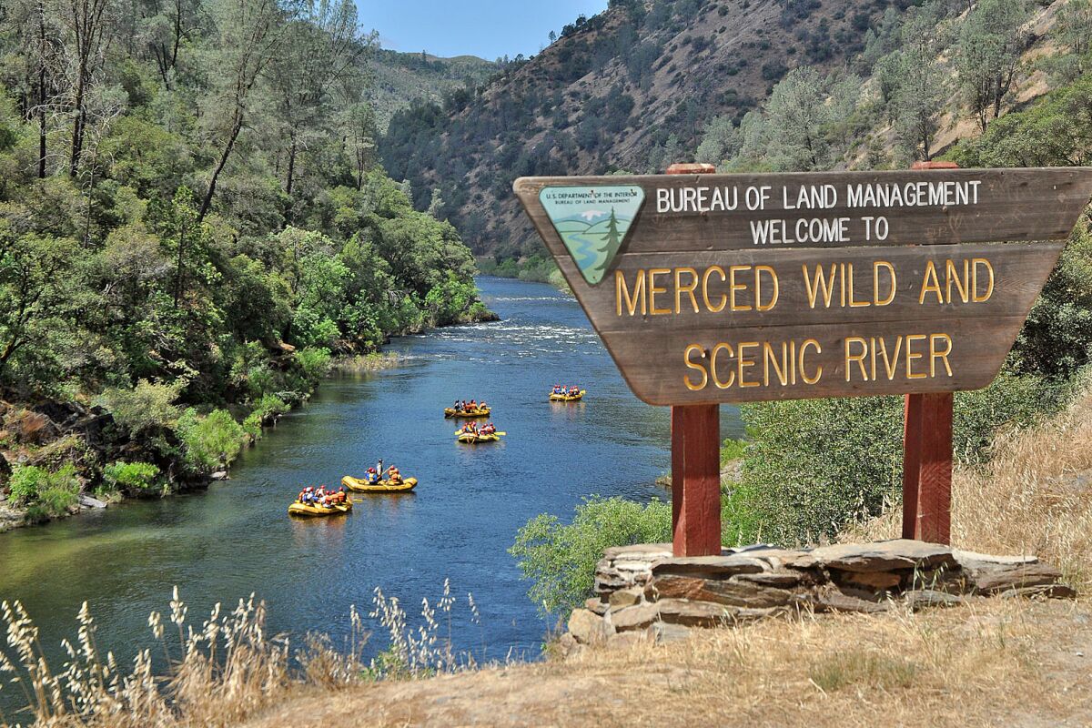 The welcome sign to the Merced River.