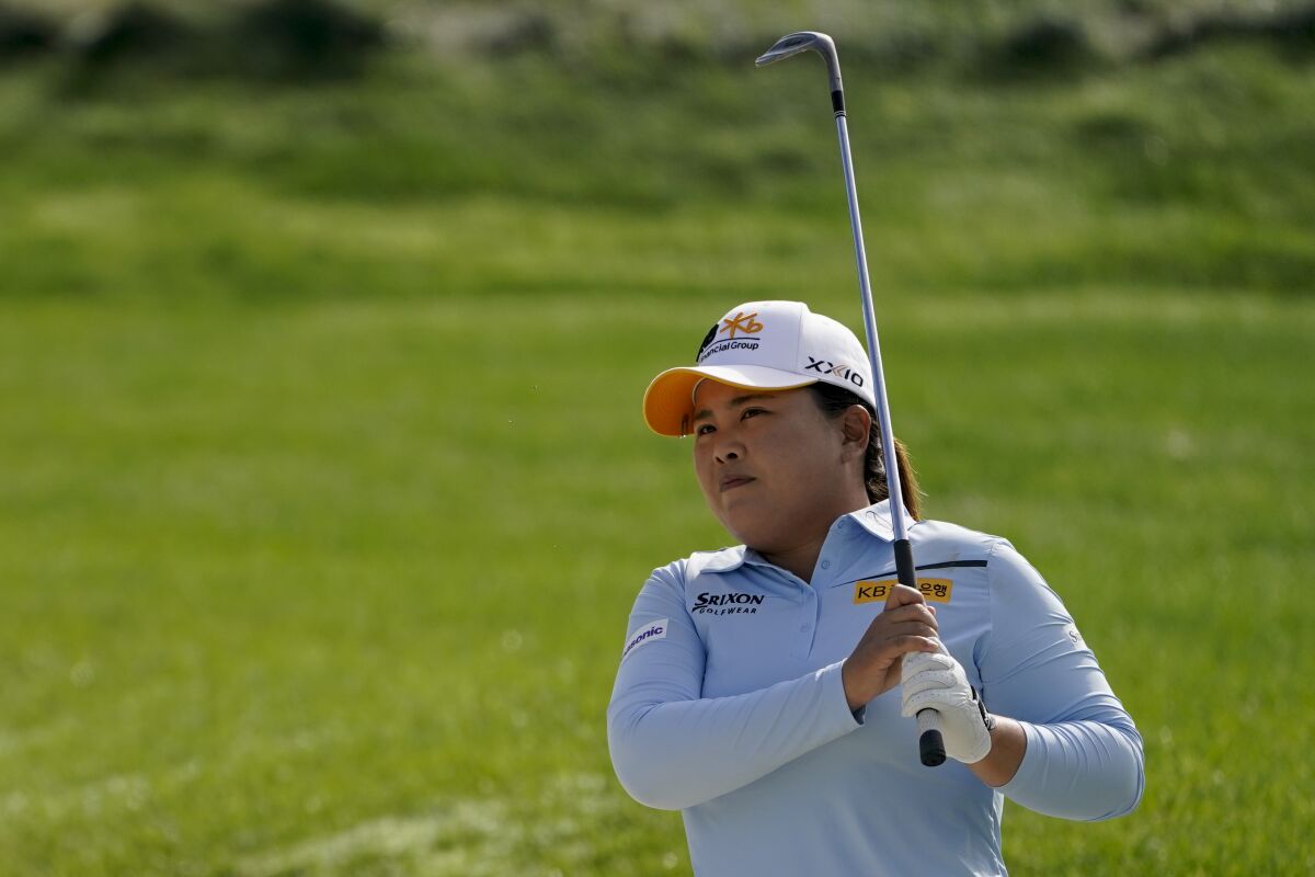 Inbee Park, of South Korea, watches her shot from a sand trap onto the 10th green in the second round of the Cognizant Founders Cup LPGA golf tournament, Friday, Oct. 8, 2021, in West Caldwell, N.J. (AP Photo/John Minchillo)