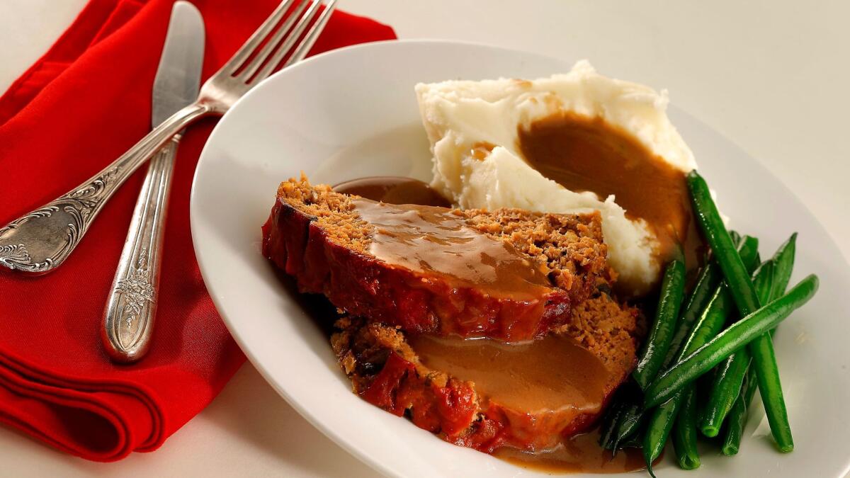 101 Coffee Shop meatloaf with mashed potatoes, gravy and green beans. (Kirk McKoy / Los Angeles Times)