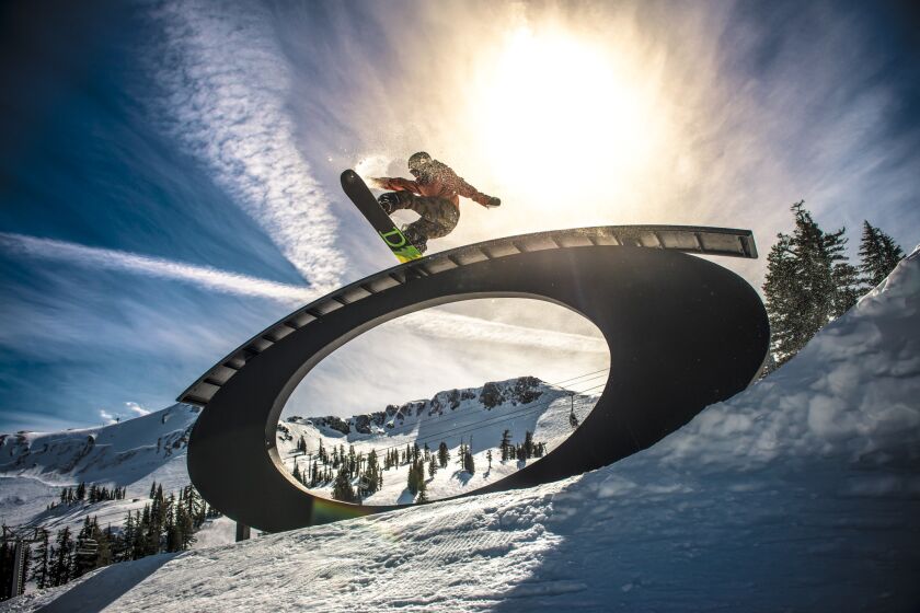 Snowboarding at Squaw Valley Alpine Meadows in Olympic Valley, Calif.