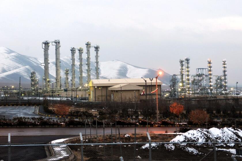 Two-thirds of the members of Iran's parliament are in favor of restarting the country's heavy-water nuclear facility at Arak, shown above in a file photo, if the U.S. Congress adopts new sanctions against Iran.