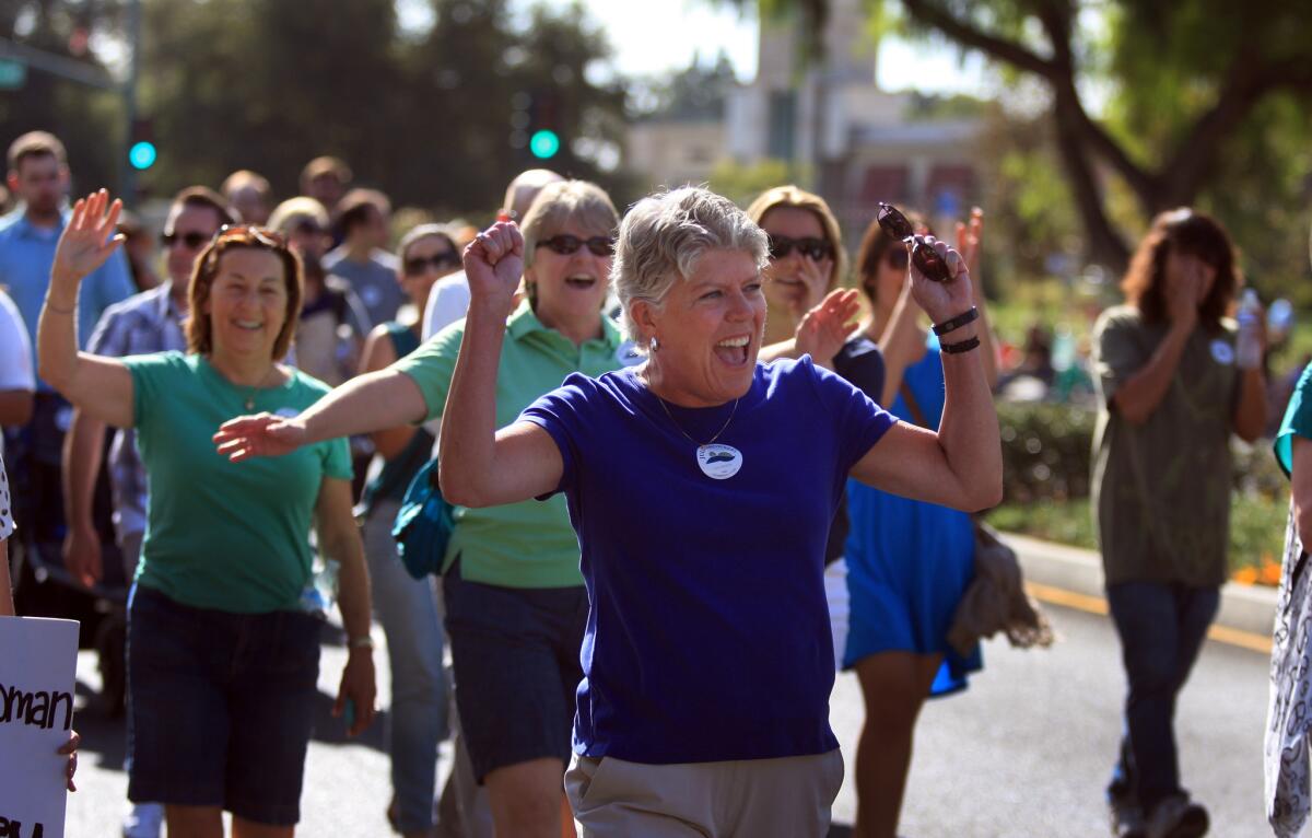 Rep. Julia Brownley (D-Westlake Village), facing a tough challenge from Assemblyman Scott Gorell (R-Camarillo), marches in a recent rally in Thousand Oaks.
