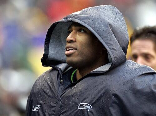 Seattle Seahawks' Shaun Alexander leaves the field with the team at halftime against the Washington Redskins during their NFC divisional playoff football game in Seattle.