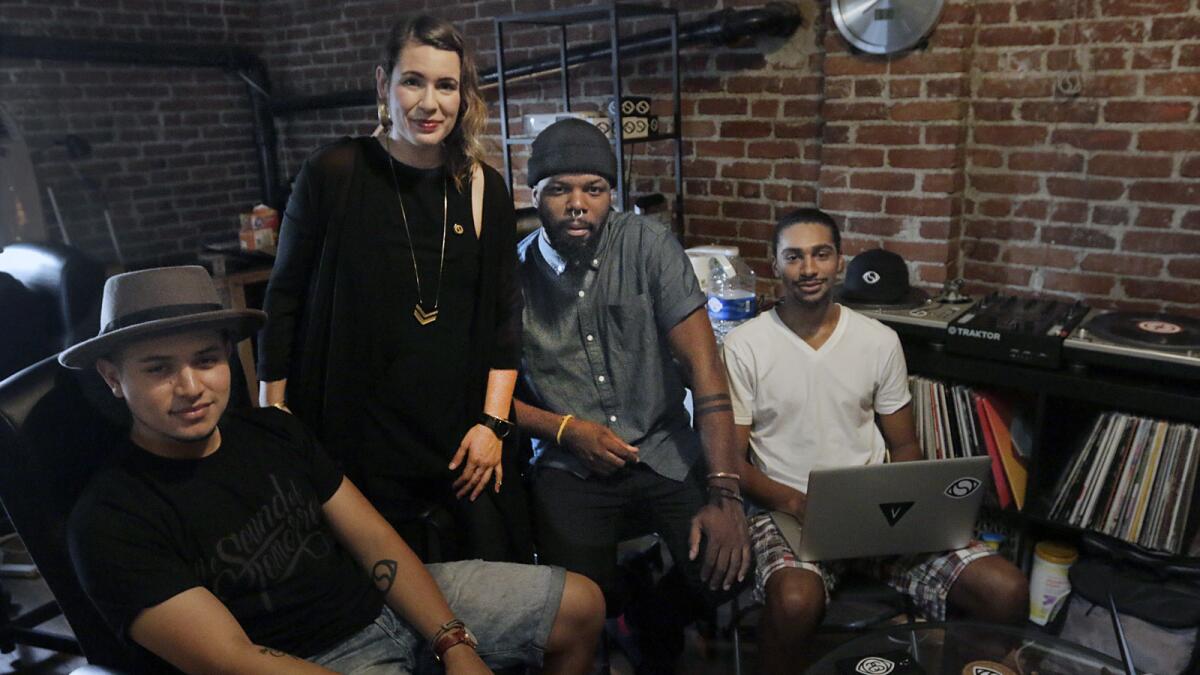 Members of Soulection, from left, Joe Kay, Jacqueline Schneider, Andre Power and Montalis Anglade are photographed at their office in Highland Park.