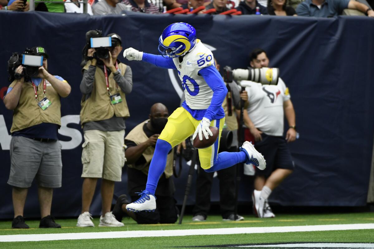  Rams linebacker Ernest Jones celebrates an interception.