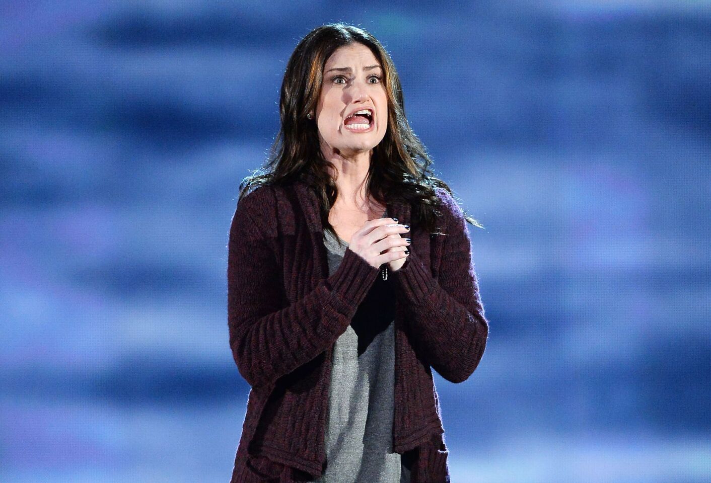 Idina Menzel performs songs from "If/Then" onstage.