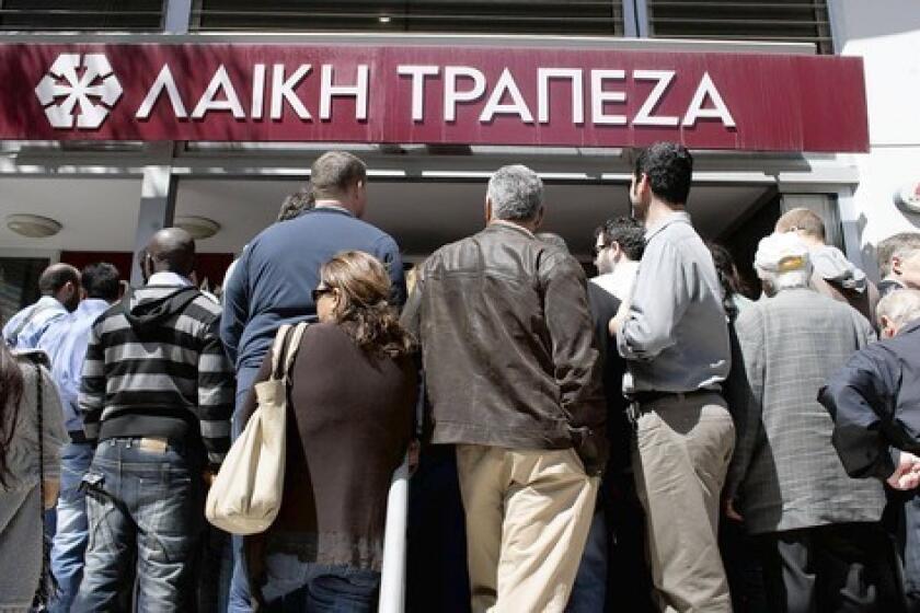 Long lines formed as Cyprus reopened its banks. Fear of a depositor stampede had hundreds of public safety officers deployed and hospitals, doctors and firefighters on alert.