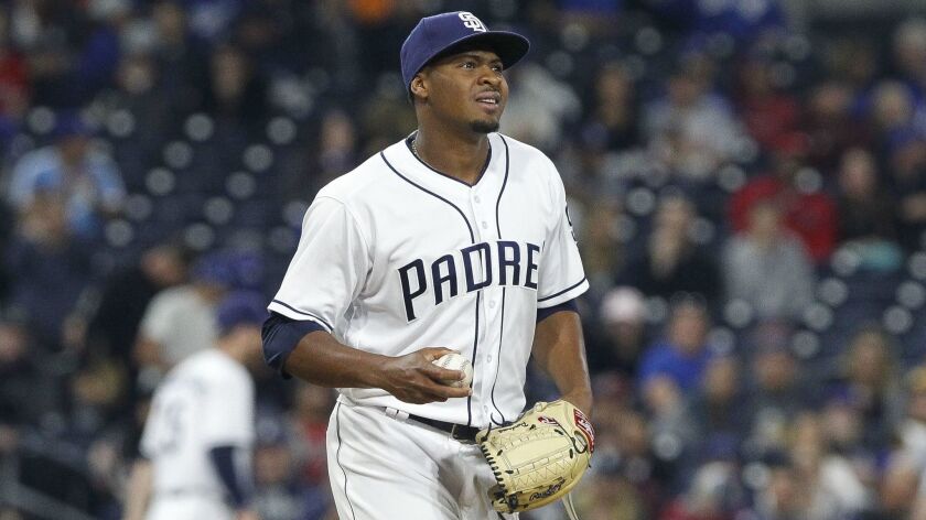 Luis Perdomo walks back to the mound during rough start against the Dodgers in April.