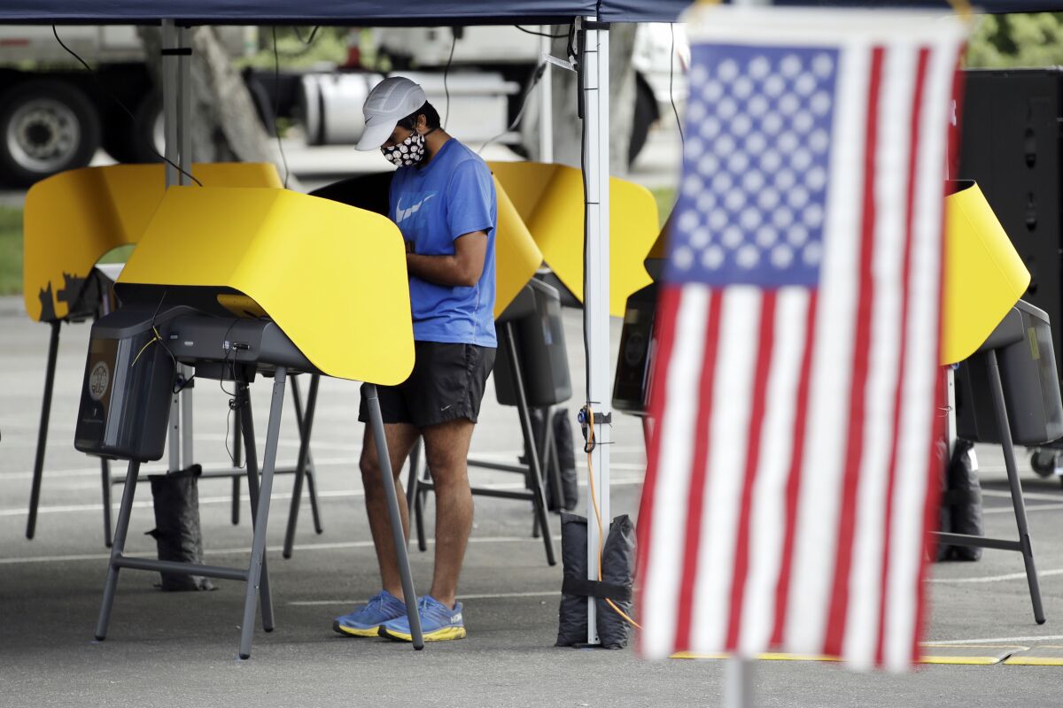 Arjan Walia votes during a special election in Santa Clarita, Calif. 