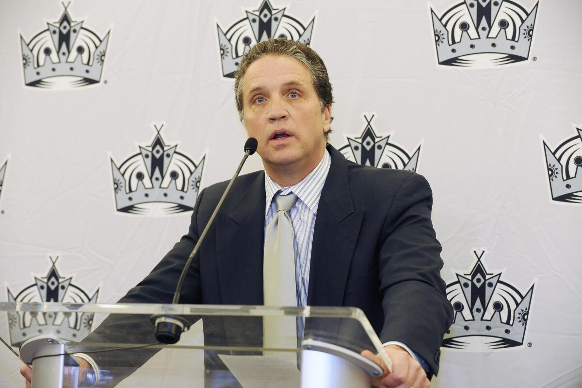 Dean Lombardi talks to reporters at a news conference in December 2011.
