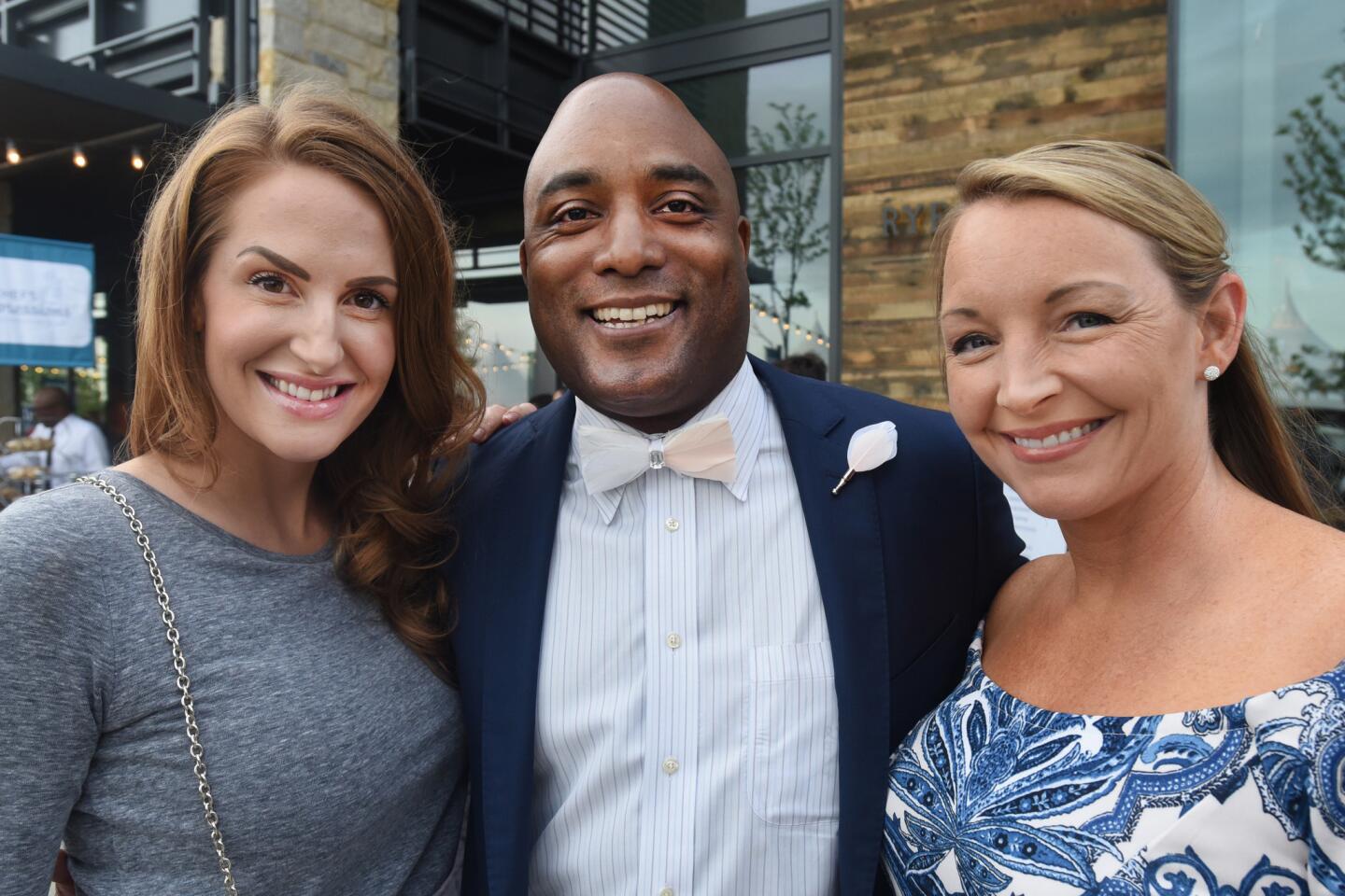 From left, Mary Brinegar, Garland Scott, and Tracey DuBree at the Bourbon and Bowties charity fundraiser held at Rye Street Tavern in Port Covington.