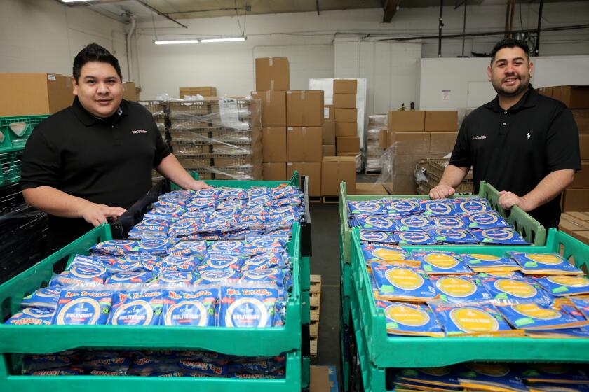 Mr. Tortilla COO Ronald Alcazar, left, and CEO Anthony Alcazar, at their manufacturing plant in San Fernando.