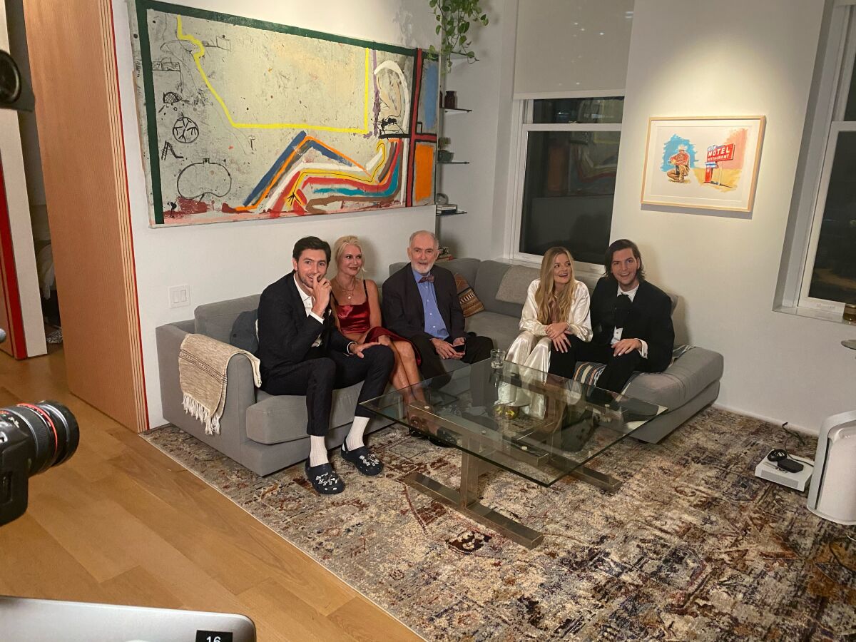 Nicholas Braun from the show "Succession" with his mom, dad, brother and brother's girlfriend, watch the Emmys.