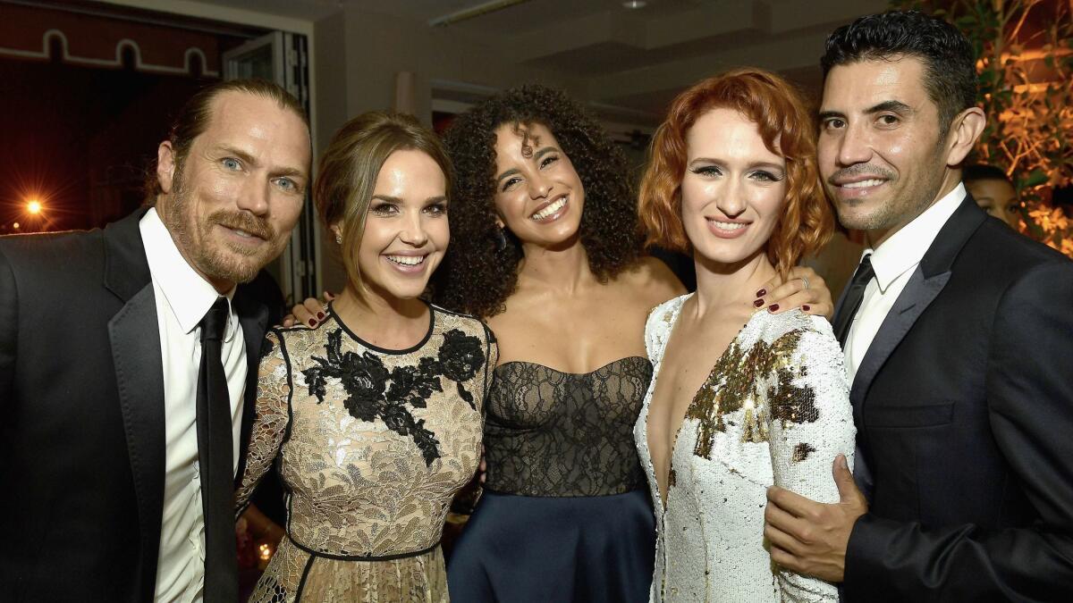 Jason Lewis, from left, Arielle Kebbel, Parisa Fitz-Henley, Breeda Wool and Bernardo Saracino at Entertainment Weekly's pre-Emmys party in West Hollywood.