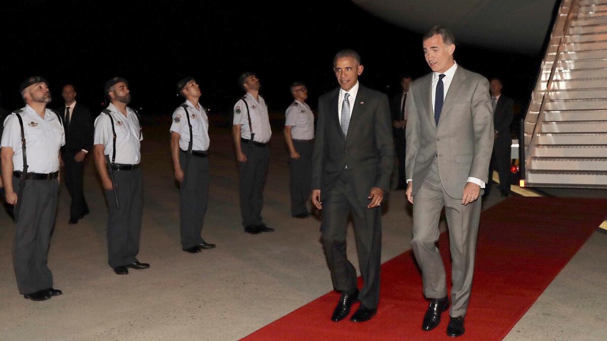 King Felipe VI welcomes President Barack Obama at Torrejon de Ardoz Air Base in Madrid.