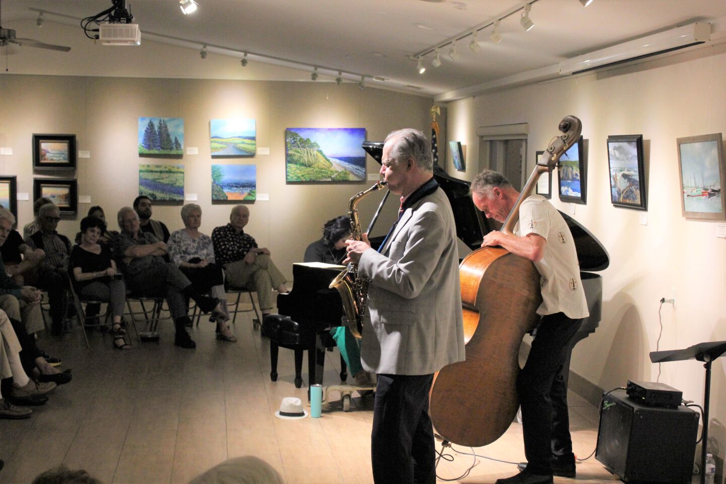 Saxophonist Christopher Hollyday, bassist Rob Thorsen and pianist Melonie Grinnell perform as part of the La Jolla Community Center's Fourth Friday Jazz Series.