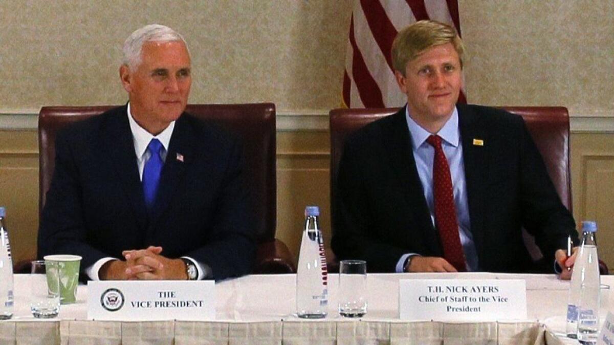 Vice President Mike Pence, left, attends a meeting in Georgia last year with his chief of staff, Nick Ayers.