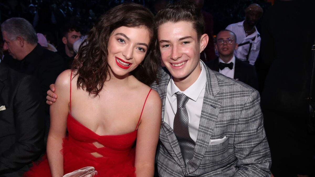 Lorde, left, and Angelo Yelich-O'Connor attend the 60th Grammy Awards at Madison Square Garden in New York on Sunday.