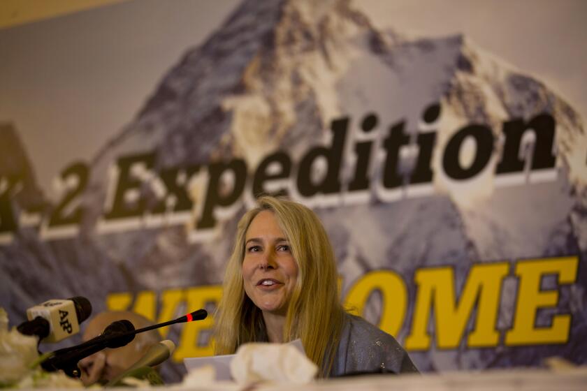 FILE - In this June 15, 2017 file photo, British-American mountaineer Vanessa O'Brien gives a news conference after arriving in Pakistan to attempt to summit K2, the world's second highest peak, in Islamabad, Pakistan. O’Brien went on to became the first American-British woman to summit K2. Dwarfed only by Mount Everest, K2 at 8,611-meter (28,250-foot) is one of the deadliest, that kills one in every four climbers who attempts it summit. (AP Photo/B.K. Bangash, File)