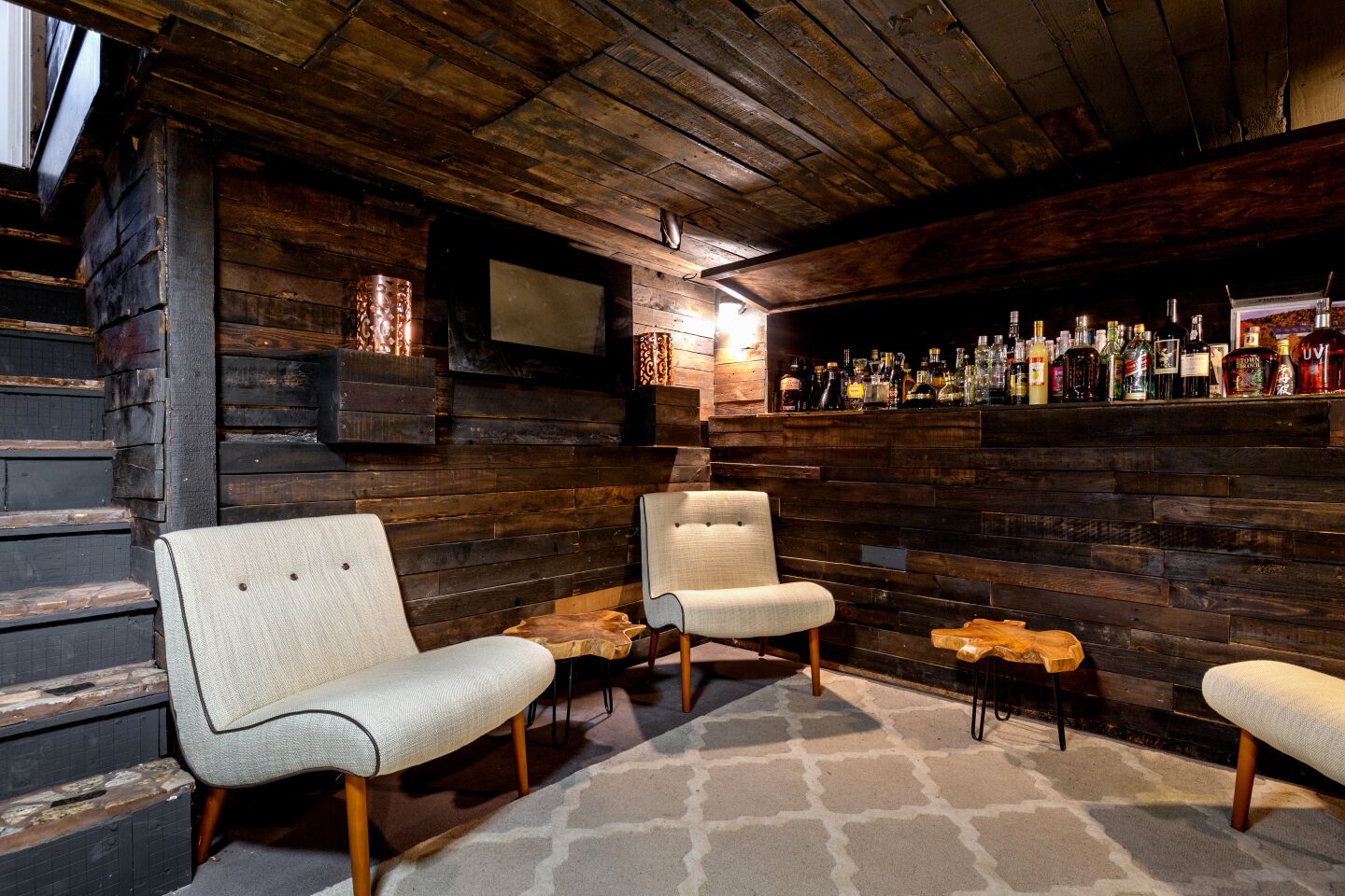 The basement has been reimagined as a bar.