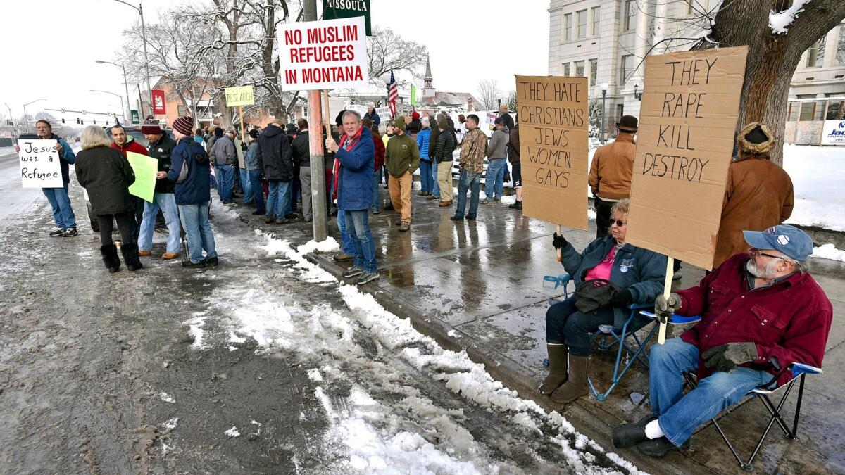 Both sides of the refugee issue demonstrate in Missoula, Mont., last year.