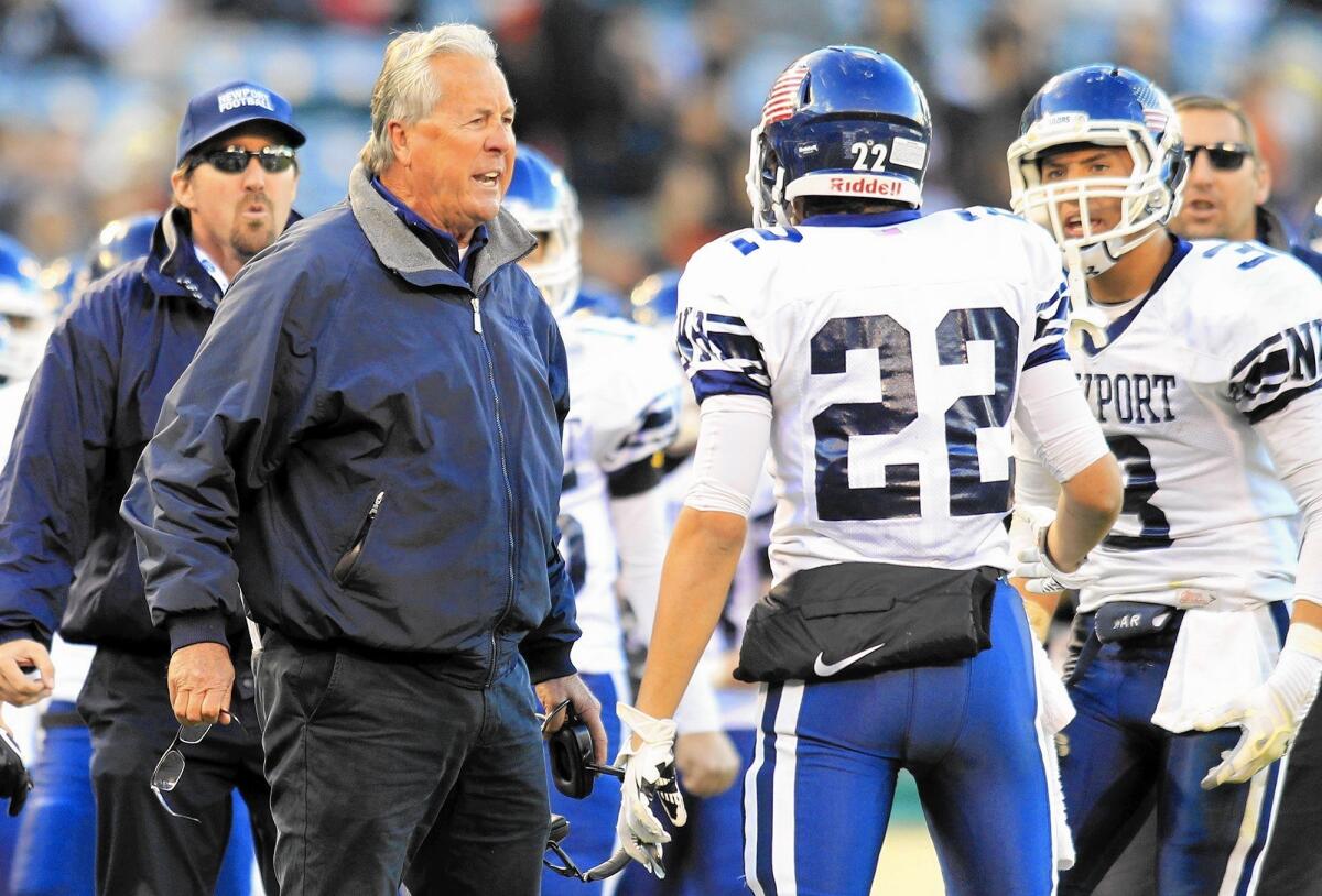 Newport Harbor High Coach Jeff Brinkley, left, seen here in the CIF Southern Section Southwest Division championship game in 2013, is entering his 30th season in charge of the Sailors.