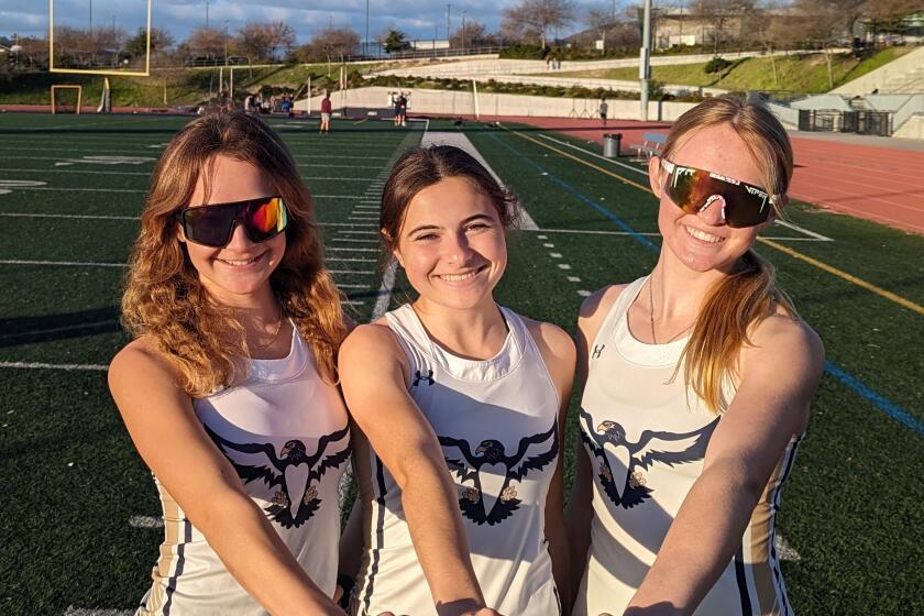 The returning members of the championship Del Norte 4x800 relay team, from left, Ella Echsner, Emily Russo and Paige Echsner.